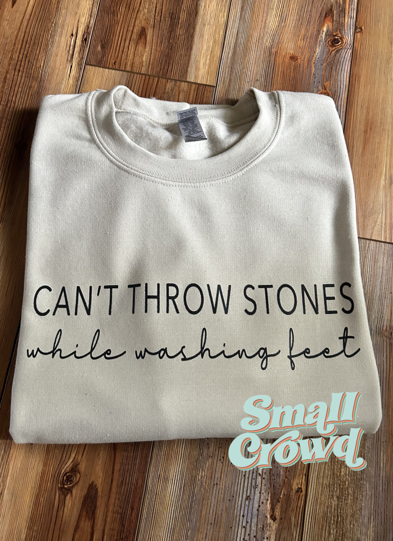 Can’t Throw Stones While Washing Feet - Sand Sweatshirt