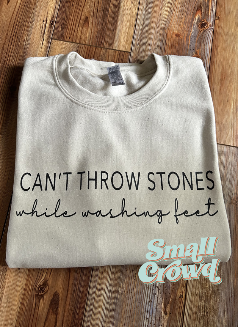 Can’t Throw Stones While Washing Feet -  Sand Sweatshirt